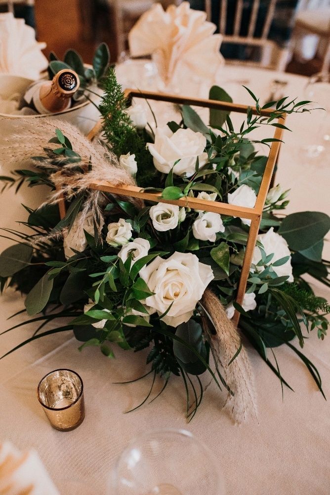 emerald green gold geo wedding centerpiece