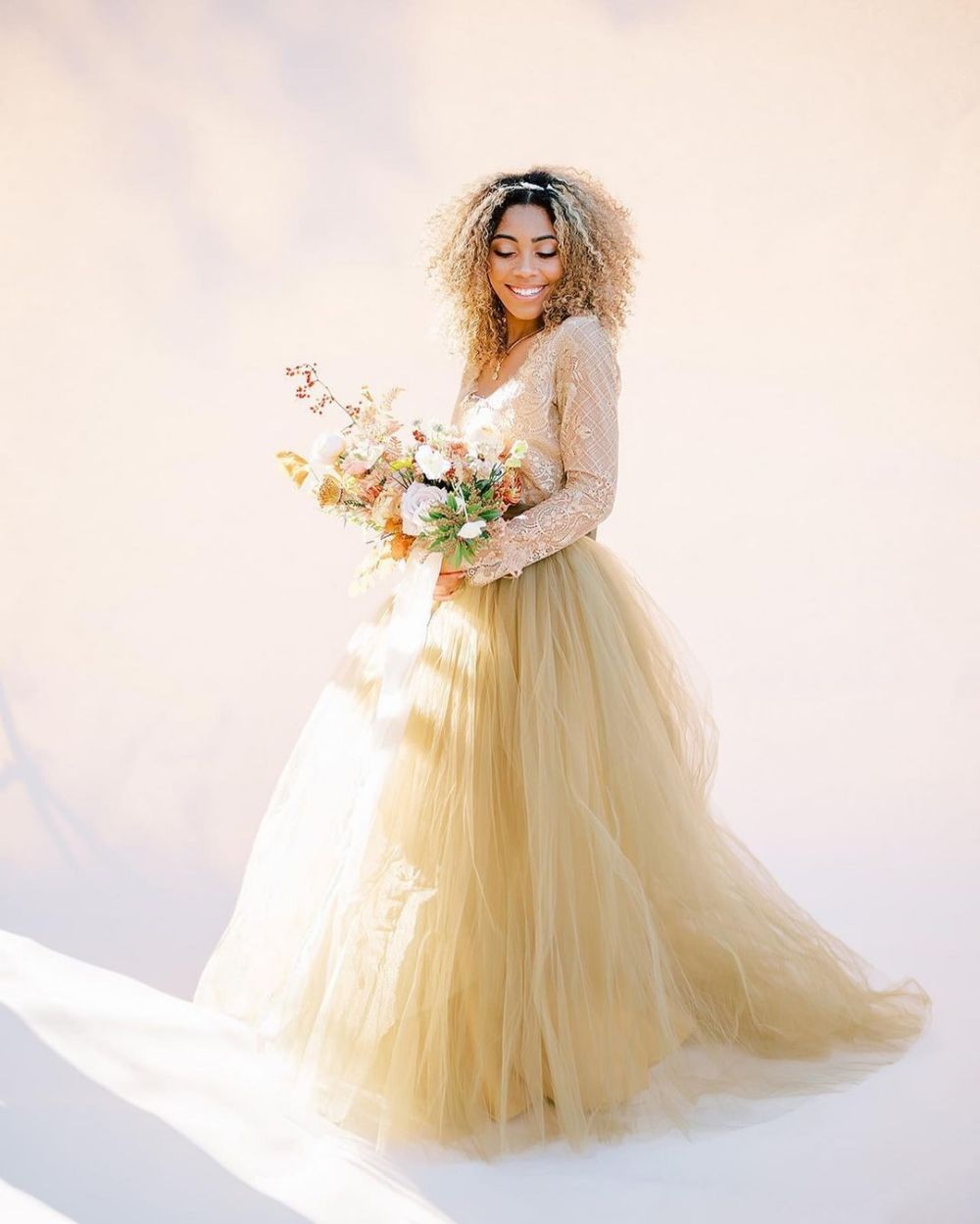 pale yellow wedding dress with white lace top