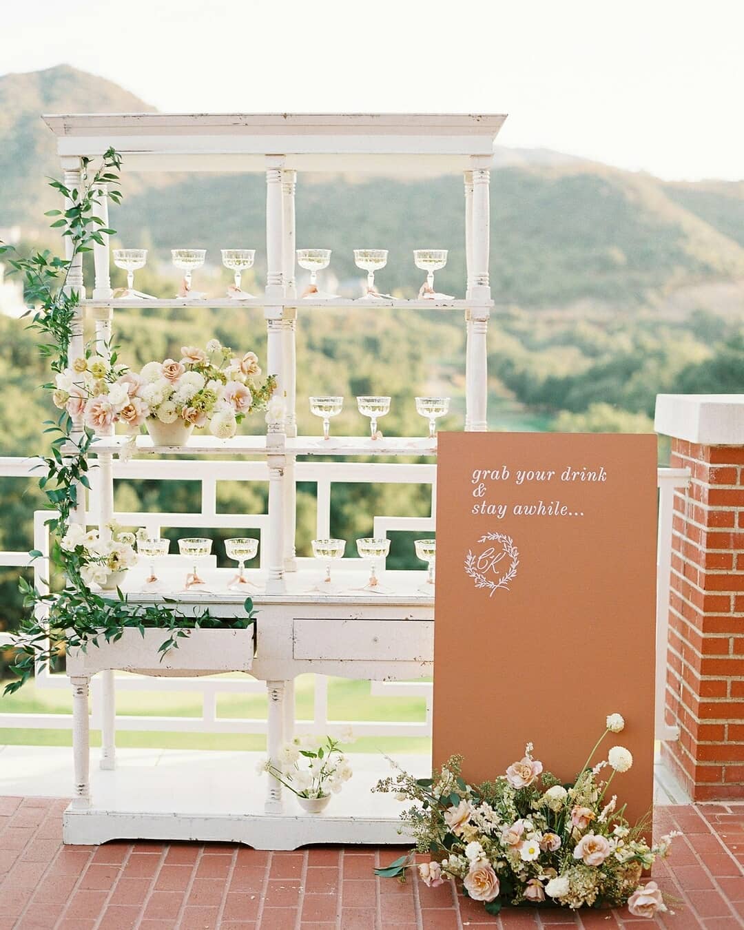 vintage champagne wall with terracotta sign