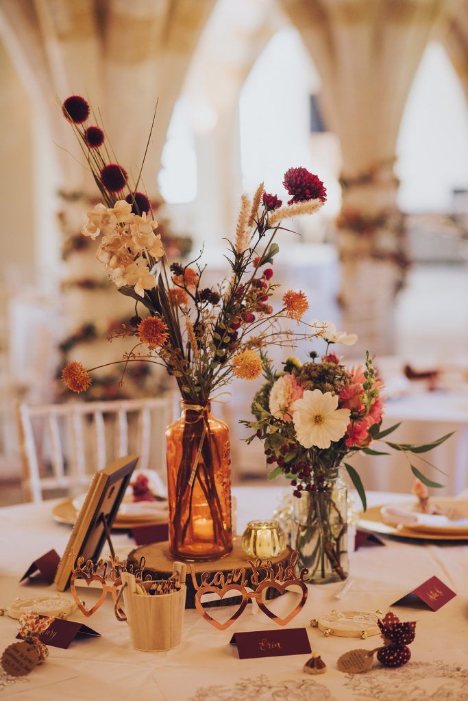 Autumnal wildflower terracotta wedding centerpiece