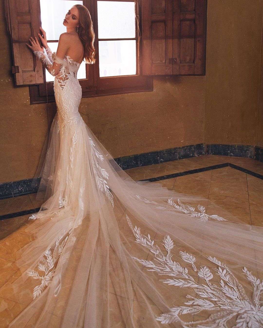 off the shoulder mermaid lace wedding gown
