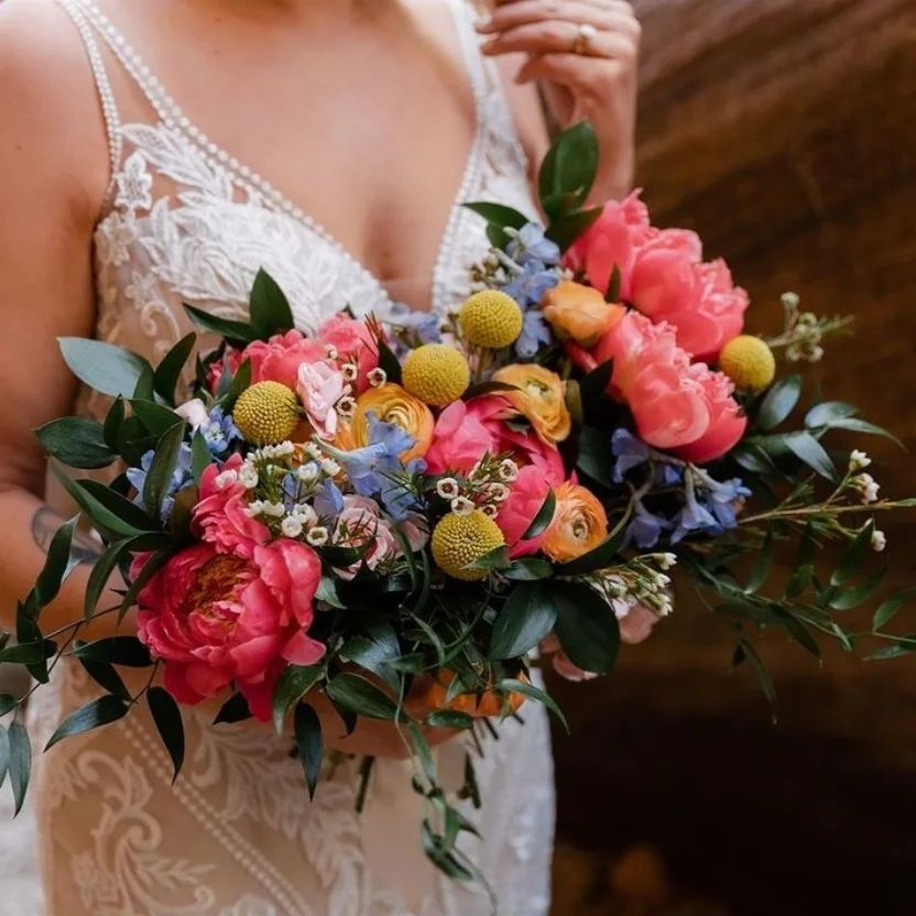 pink peony and yellow cephalipterum summer wedding bouquet via jocelynsfloral