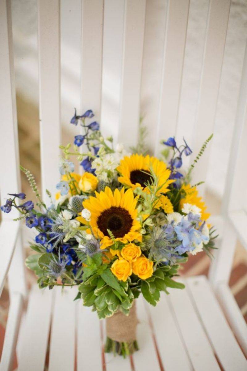 sunflower bridal bouquet with blue flowers