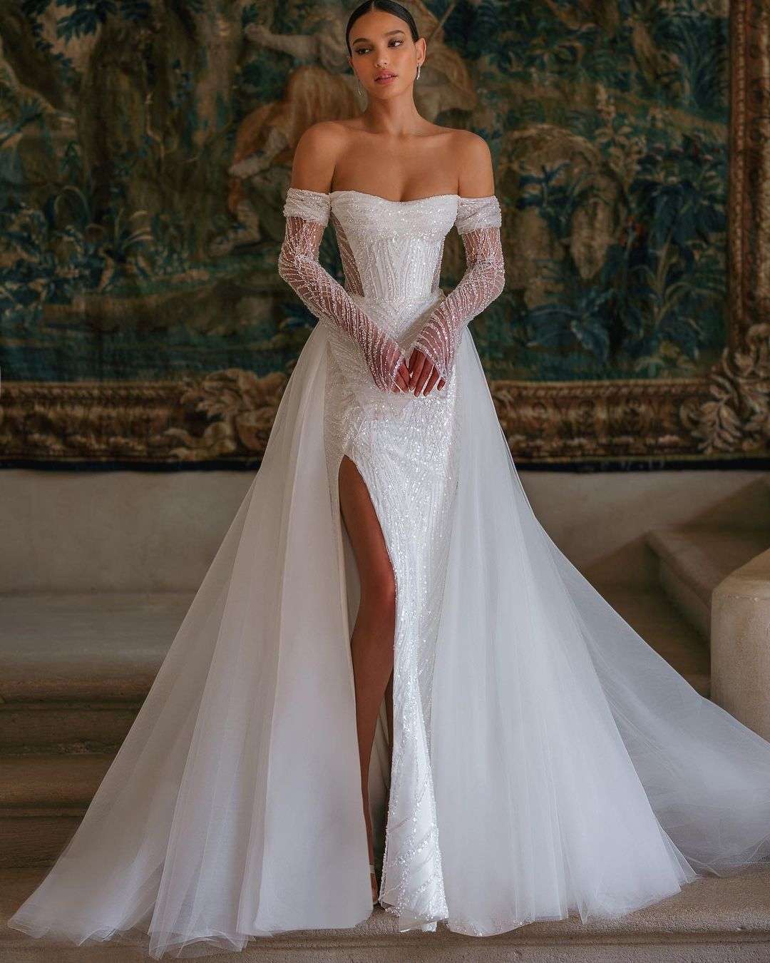 white sequined off the shoulder long sleeves wedding dress with removable skirt superiorbridal
