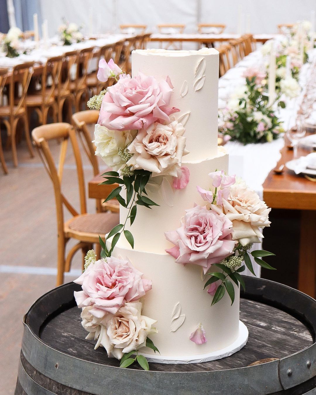 3 tier simple elegant wedding cake with pink roses via milkandhoney.cakecreative
