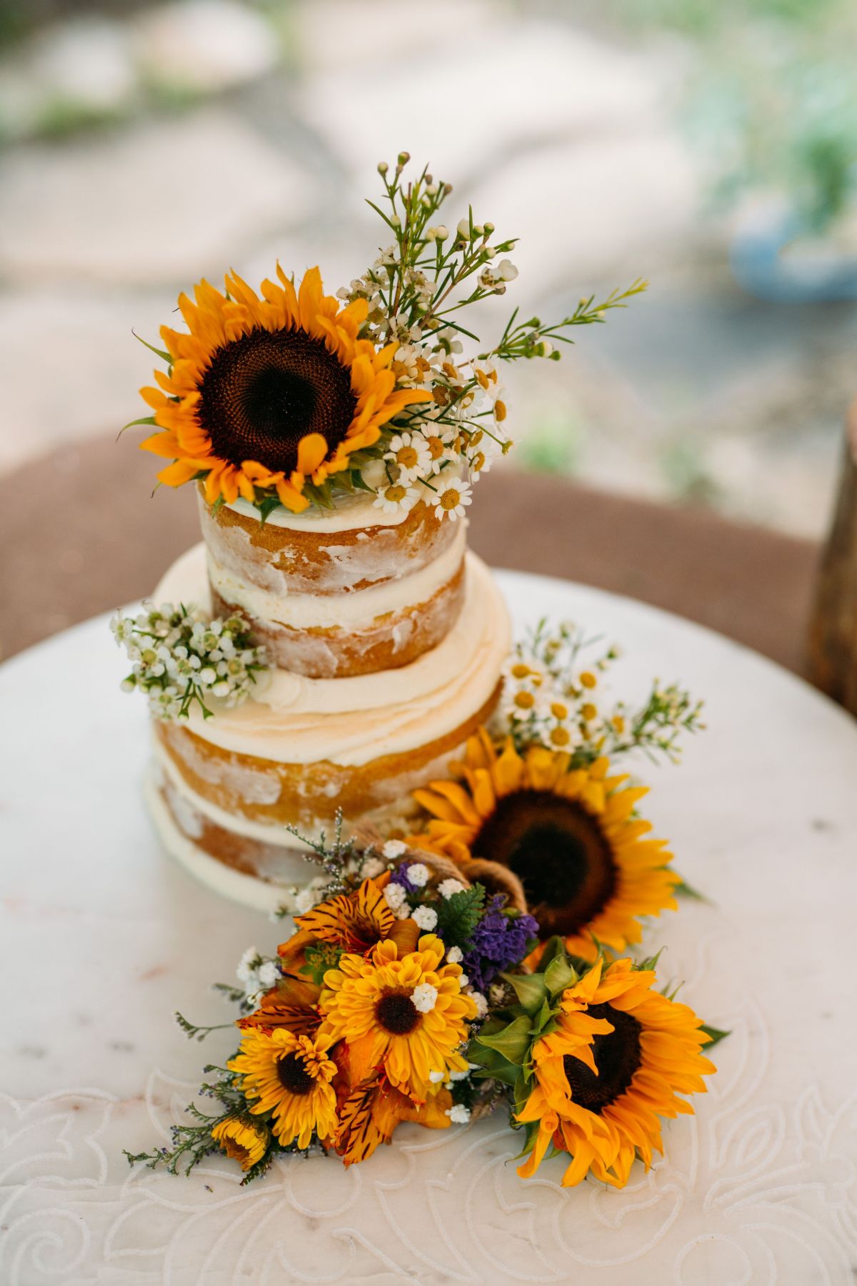 Semi-Naked Sunflower Wedding Cake with Wildflowers