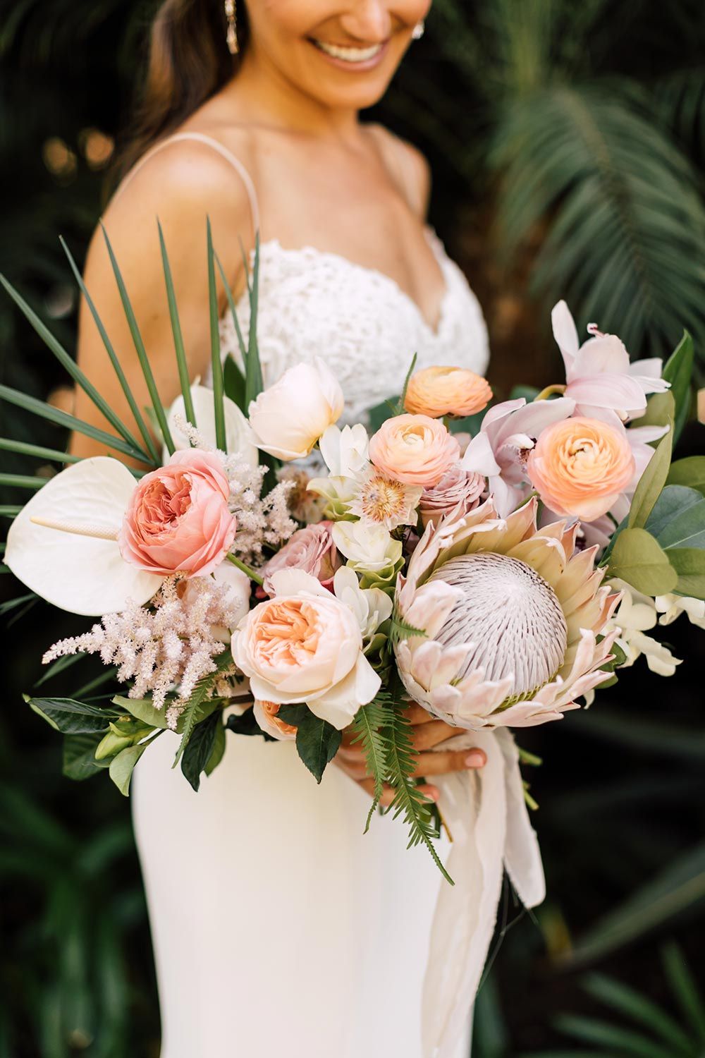 Tropical Beach Wedding with Palm Fronds and Ocean Breeze