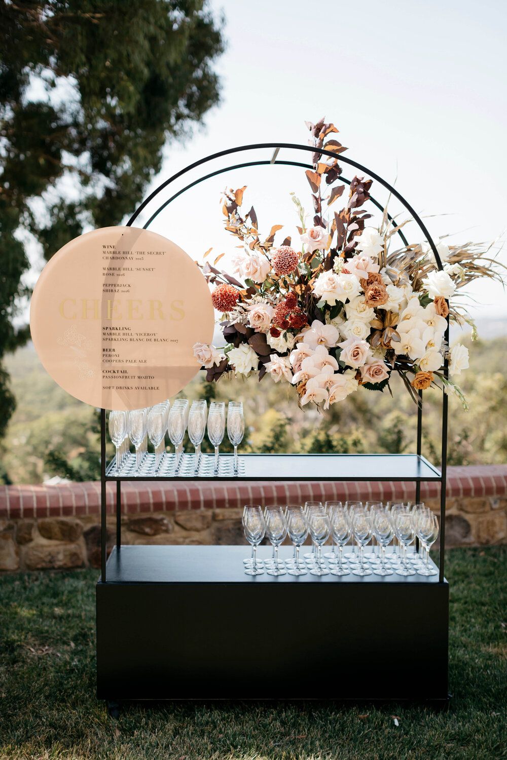 black and rose gold wedding drink bar decoration