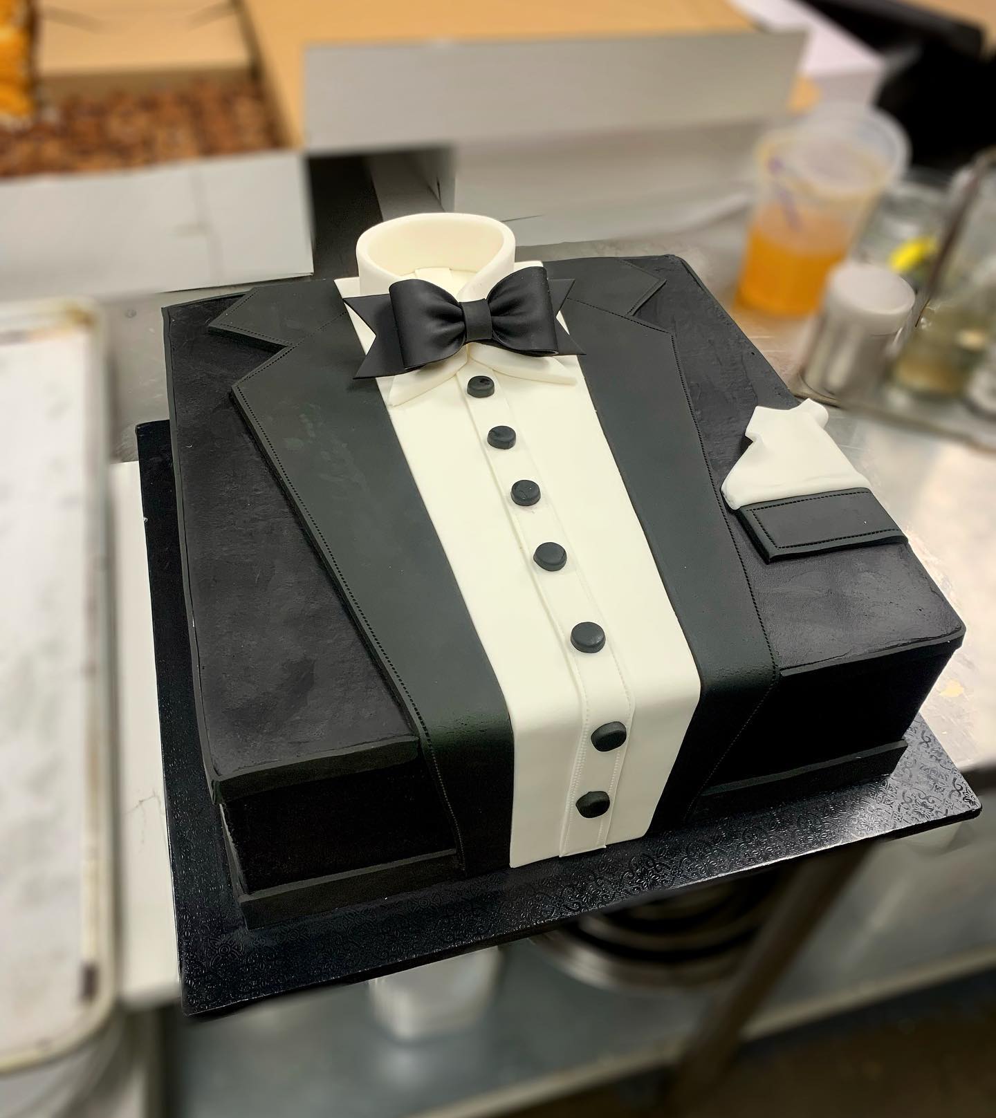black suit groom cake for wedding