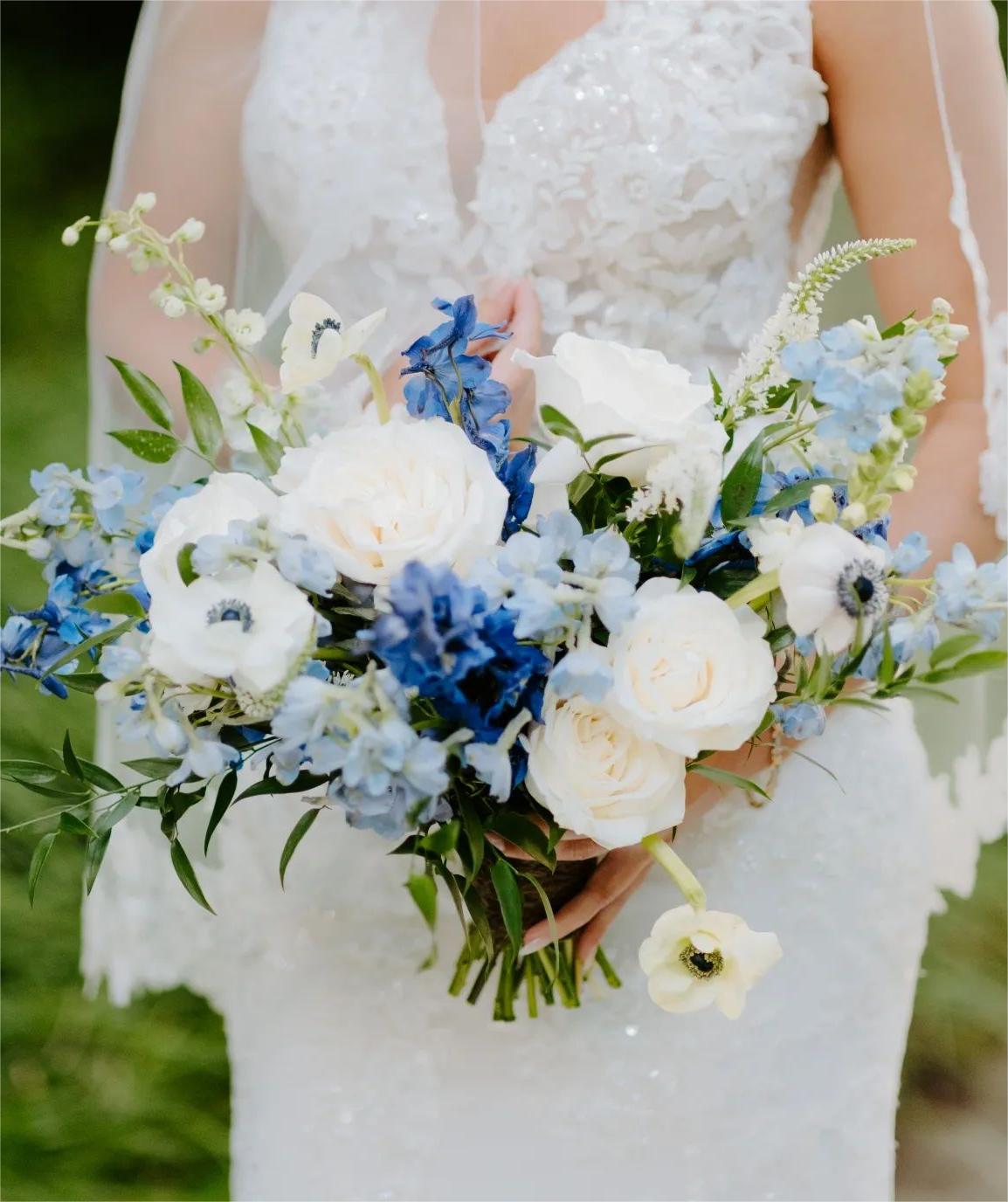 blue wedding bouquet via newcreationfloral