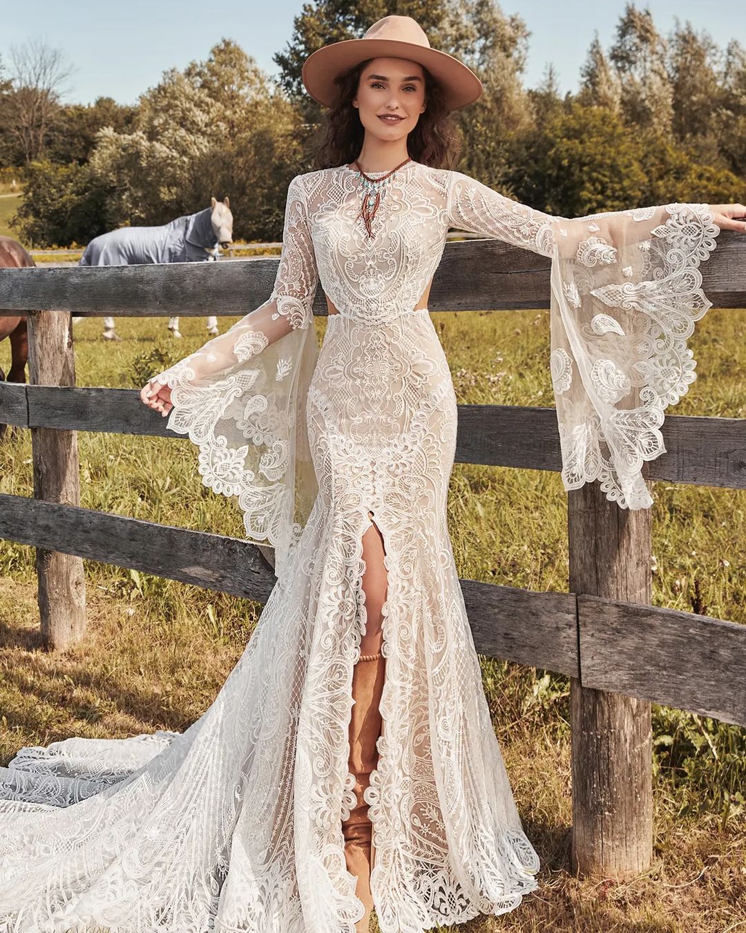 bohemian country mermaid wedding dress with long bell sleeves and side slit