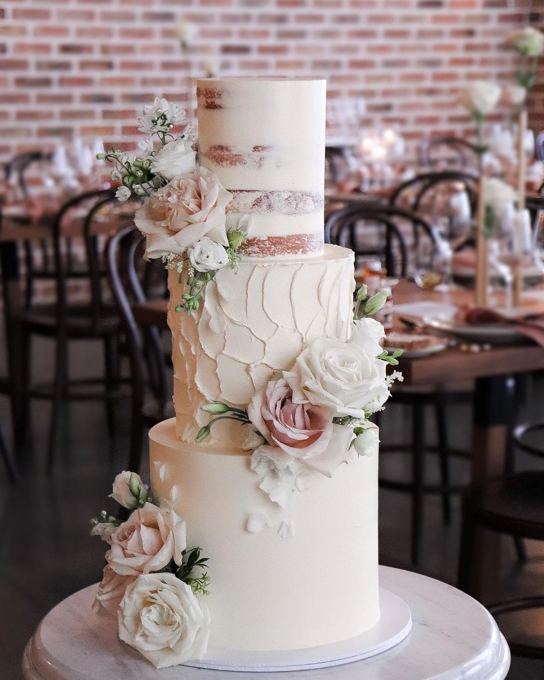 classic semi-naked white wedding cake with roses via milkandhoney.cakecreative