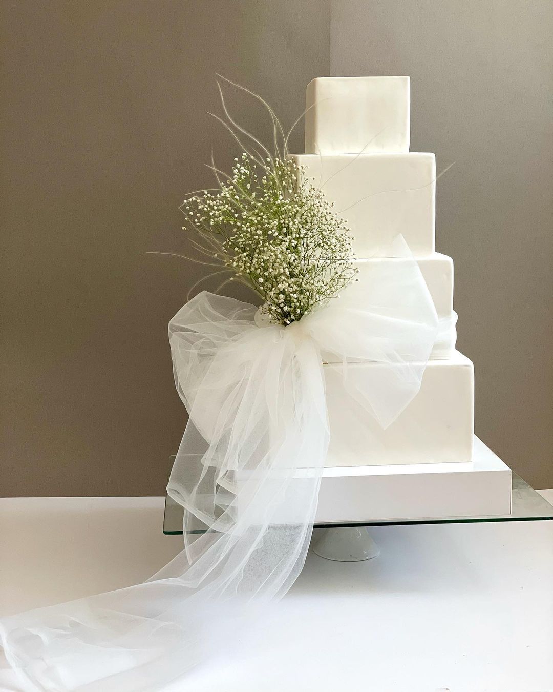elegant 4 tier square wedding cake via negin_cake_studio
