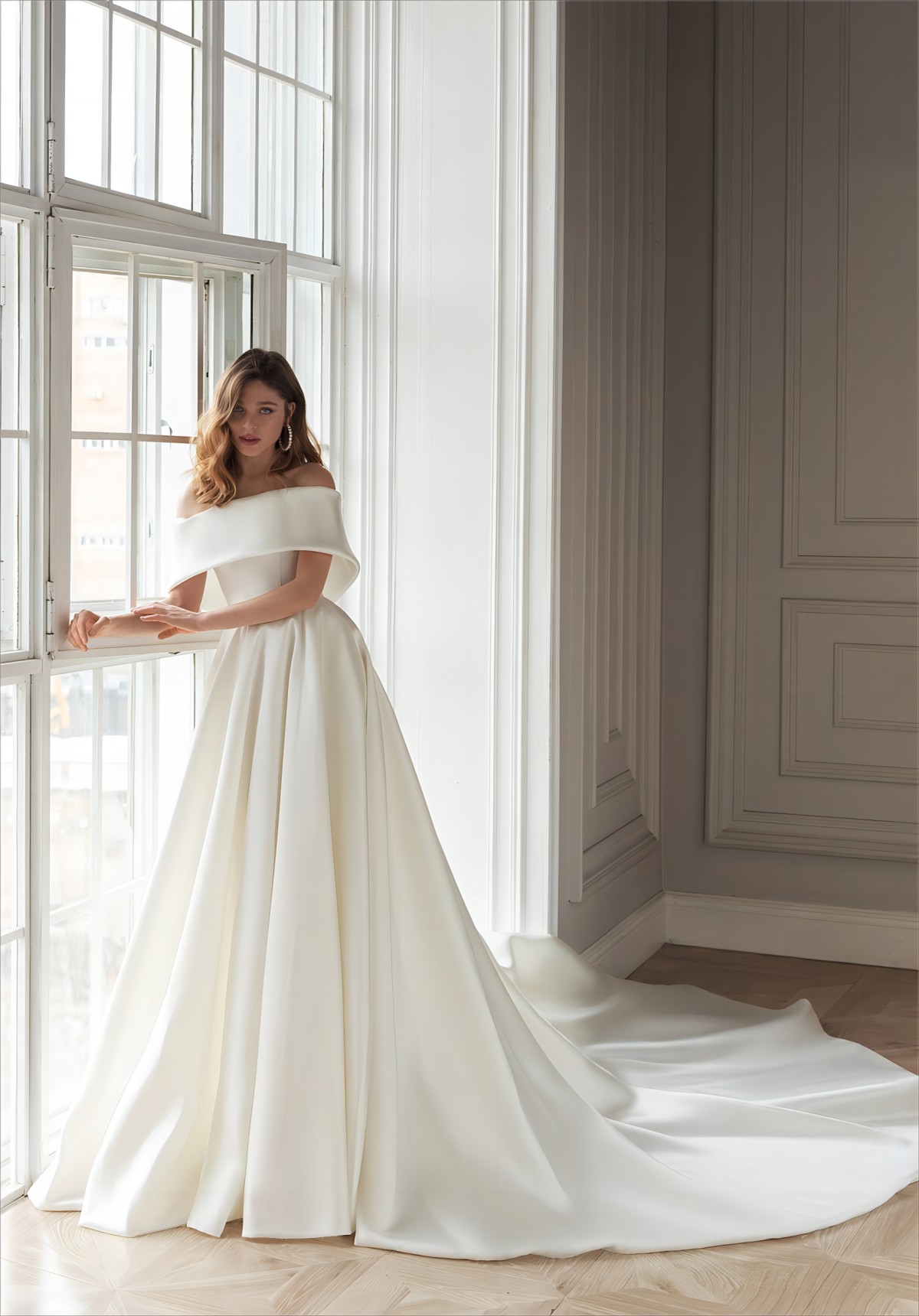 elegant A-line off the shoulder satin wedding gown