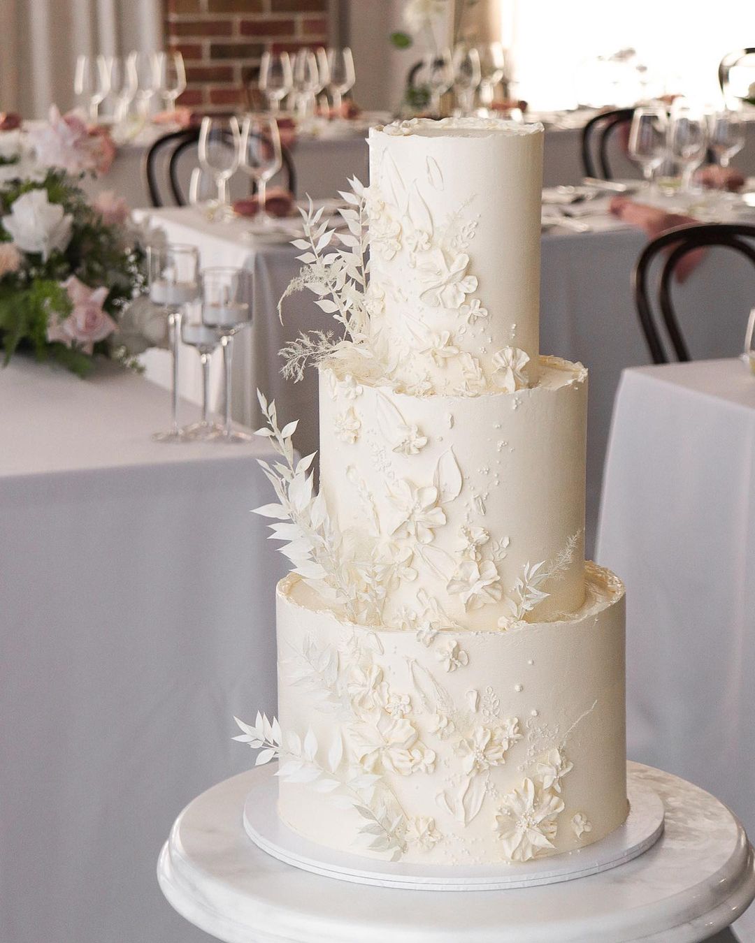 elegant all white 3 tier wedding cake via milkandhoney.cakecreative