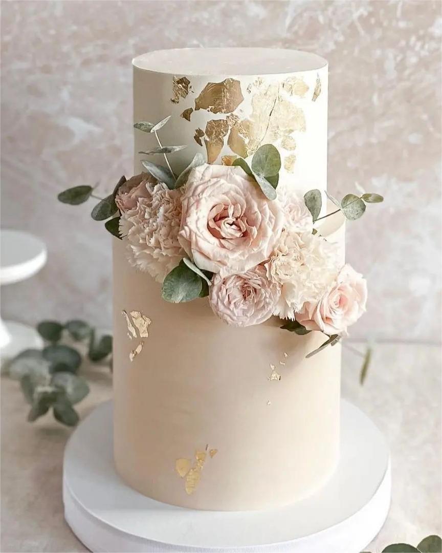 elegant blush wedding cake with gold foils via taraacakes