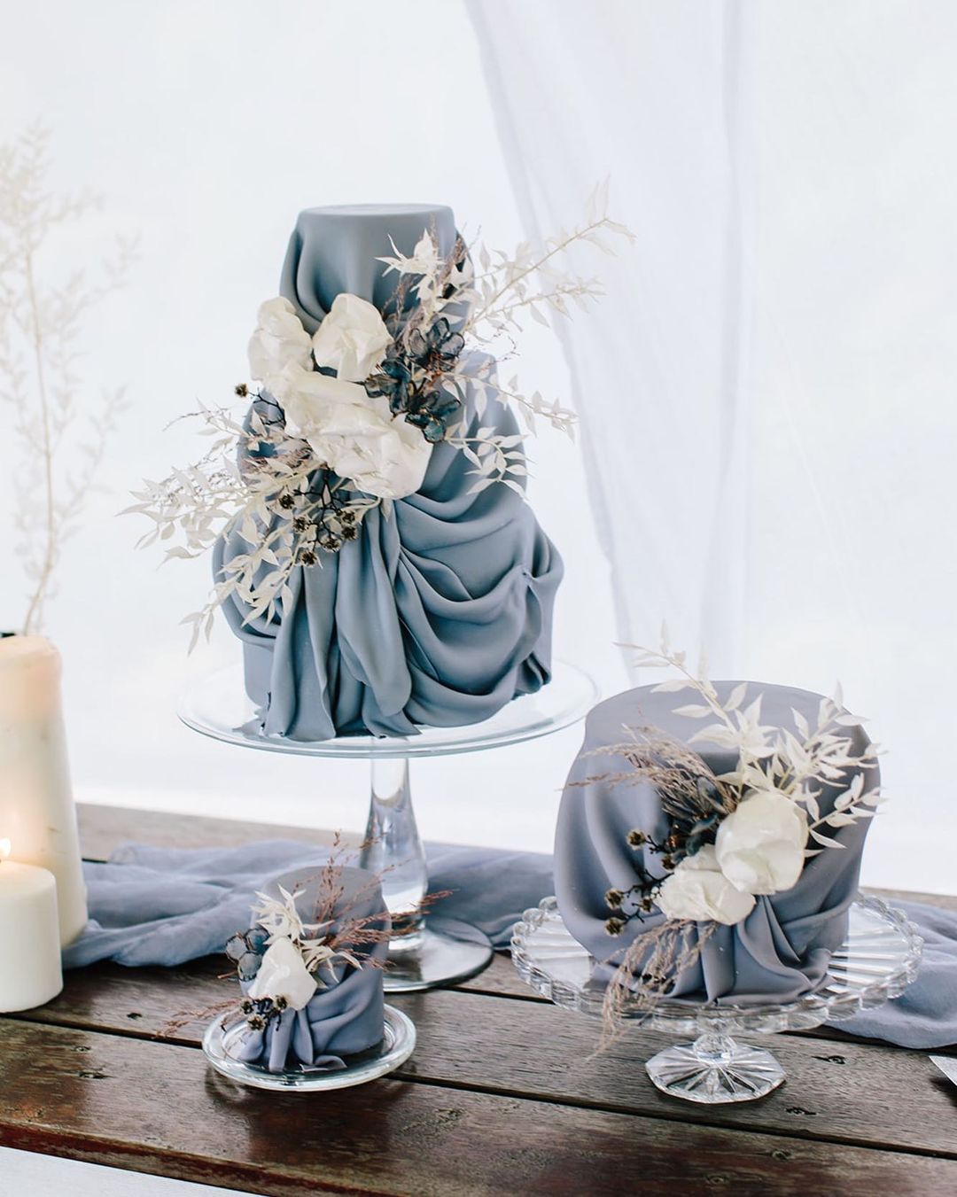 elegant dusty blue tiered wedding cakes via marinamachadocakes
