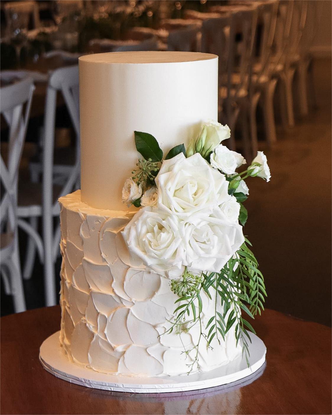 elegant simple wedding cake with white flowers via milkandhoney.cakecreative