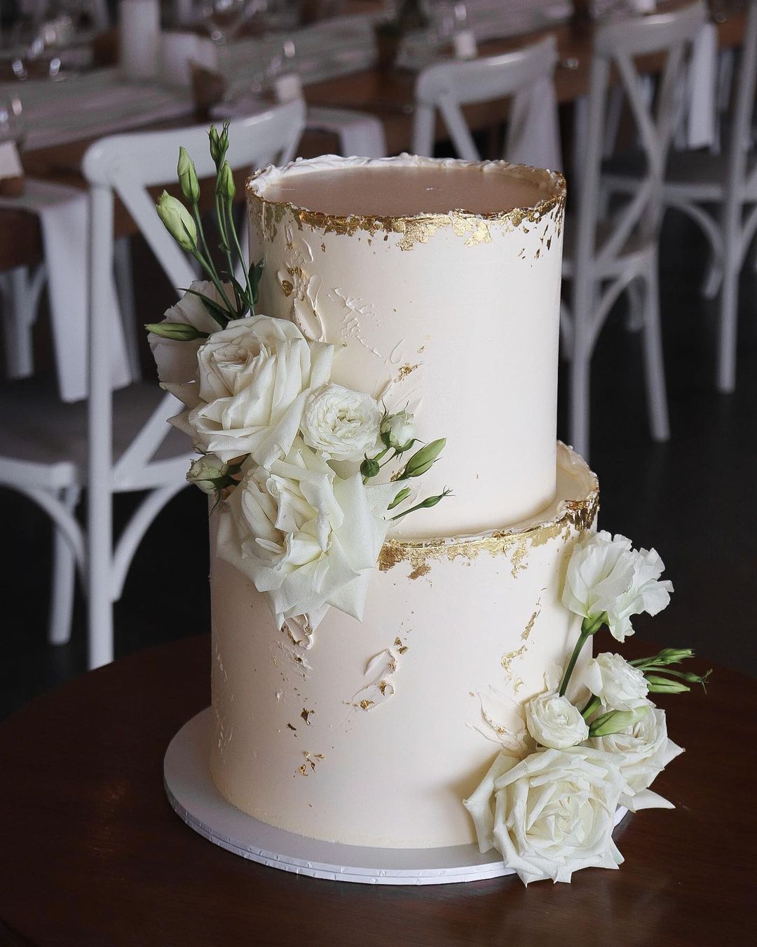elegant white and gold flakes wedding cake via milkandhoney.cakecreative