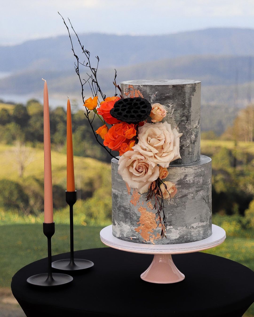 grey modern wedding cake with flowers for fall wedding via milkandhoney.cakecreative