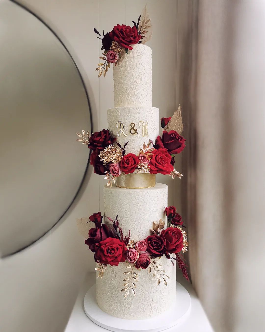 luxury red and gold three tier wedding cake via littlemissfattycakes