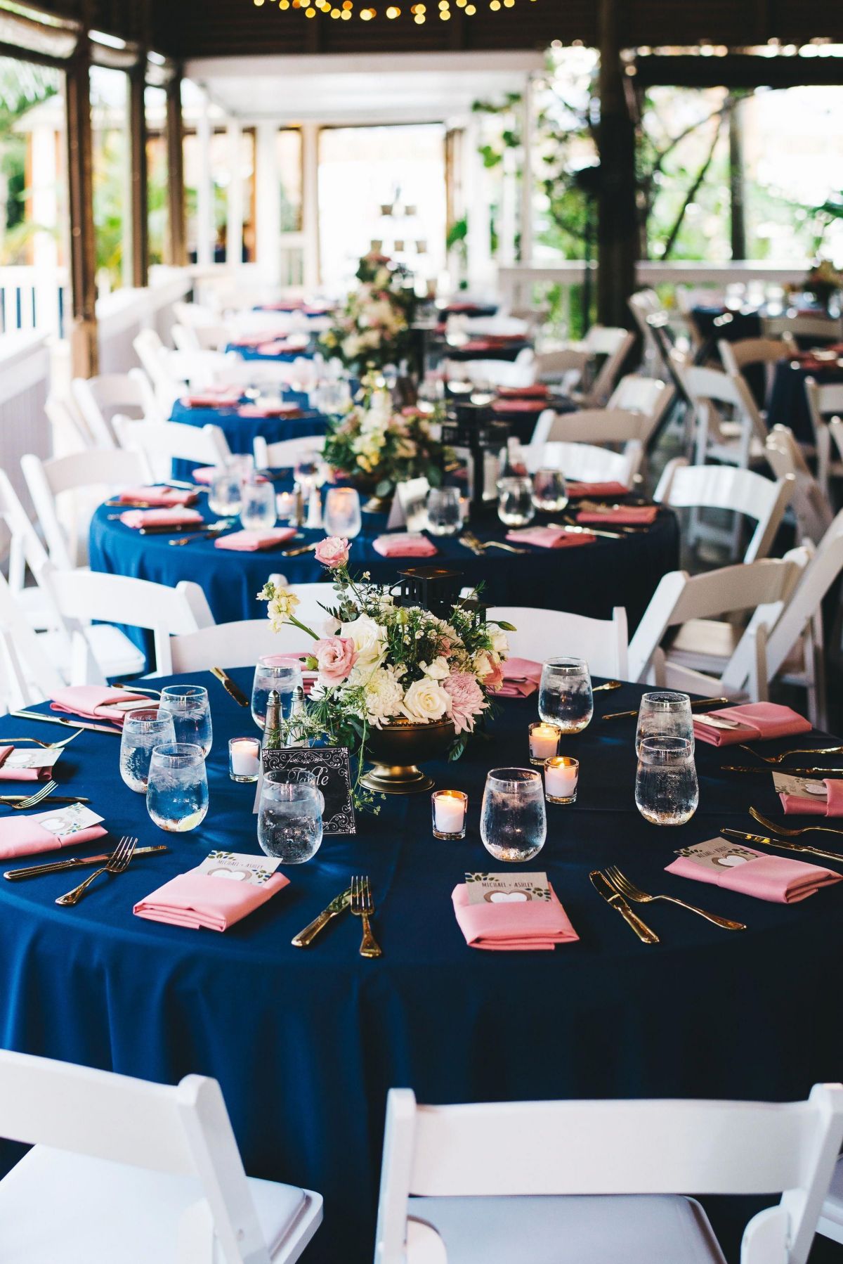 navy tablecloths and blush pink napkins for round wedding table