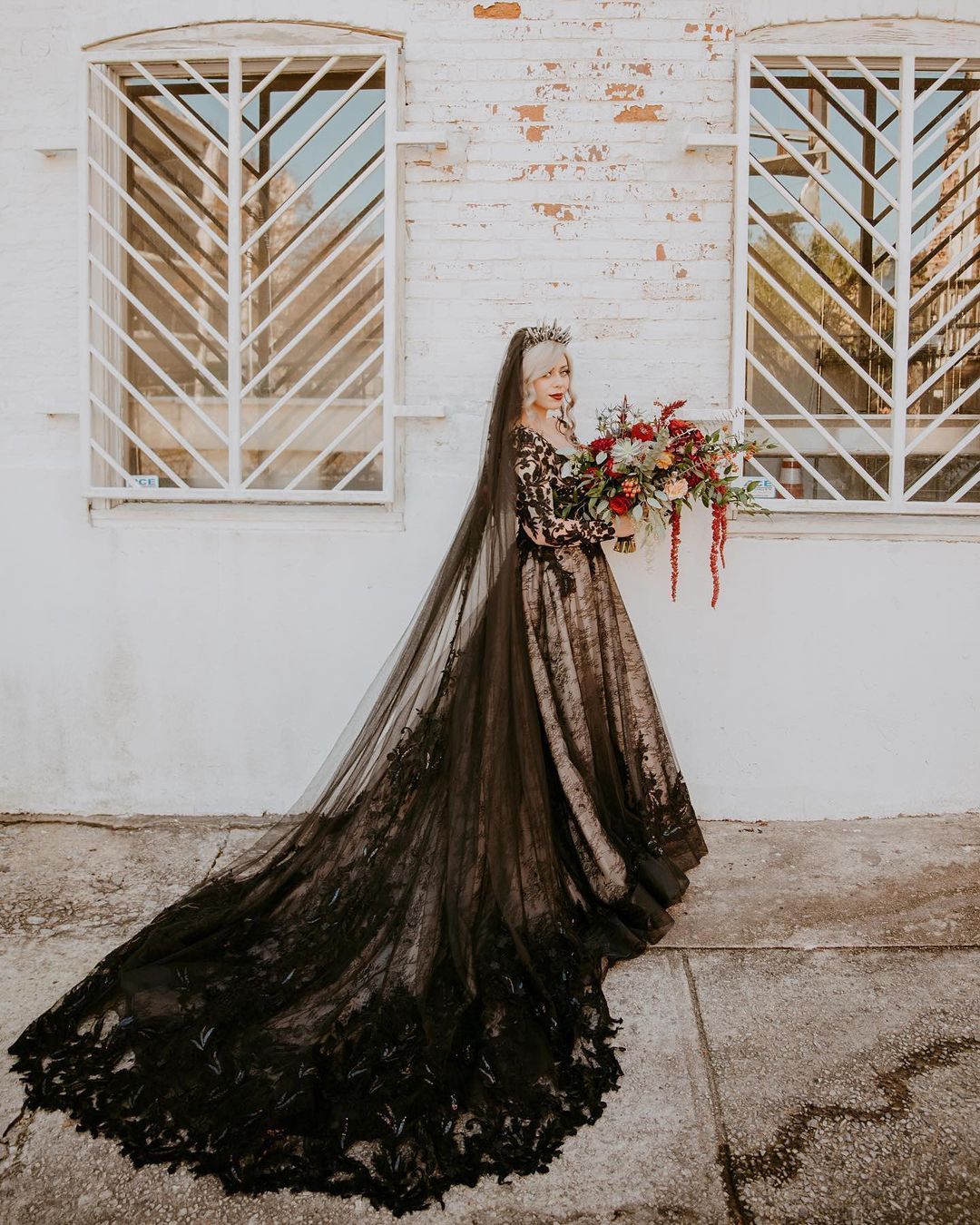 nude and black gothic lace wedding dress with black veil
