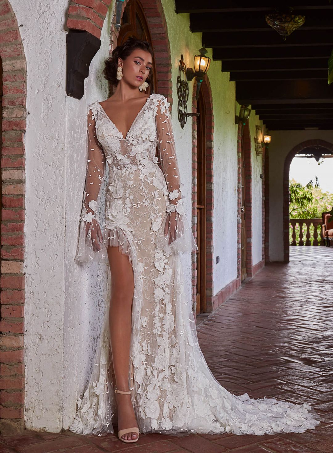 open back 3D lace sheath silhouette wedding gown with long bell sleeves and side slit