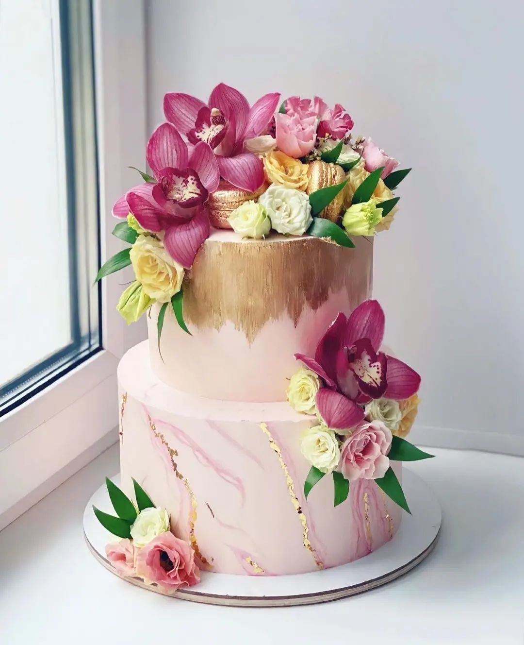 pink marble wedding cake with gold foli via taraacakes