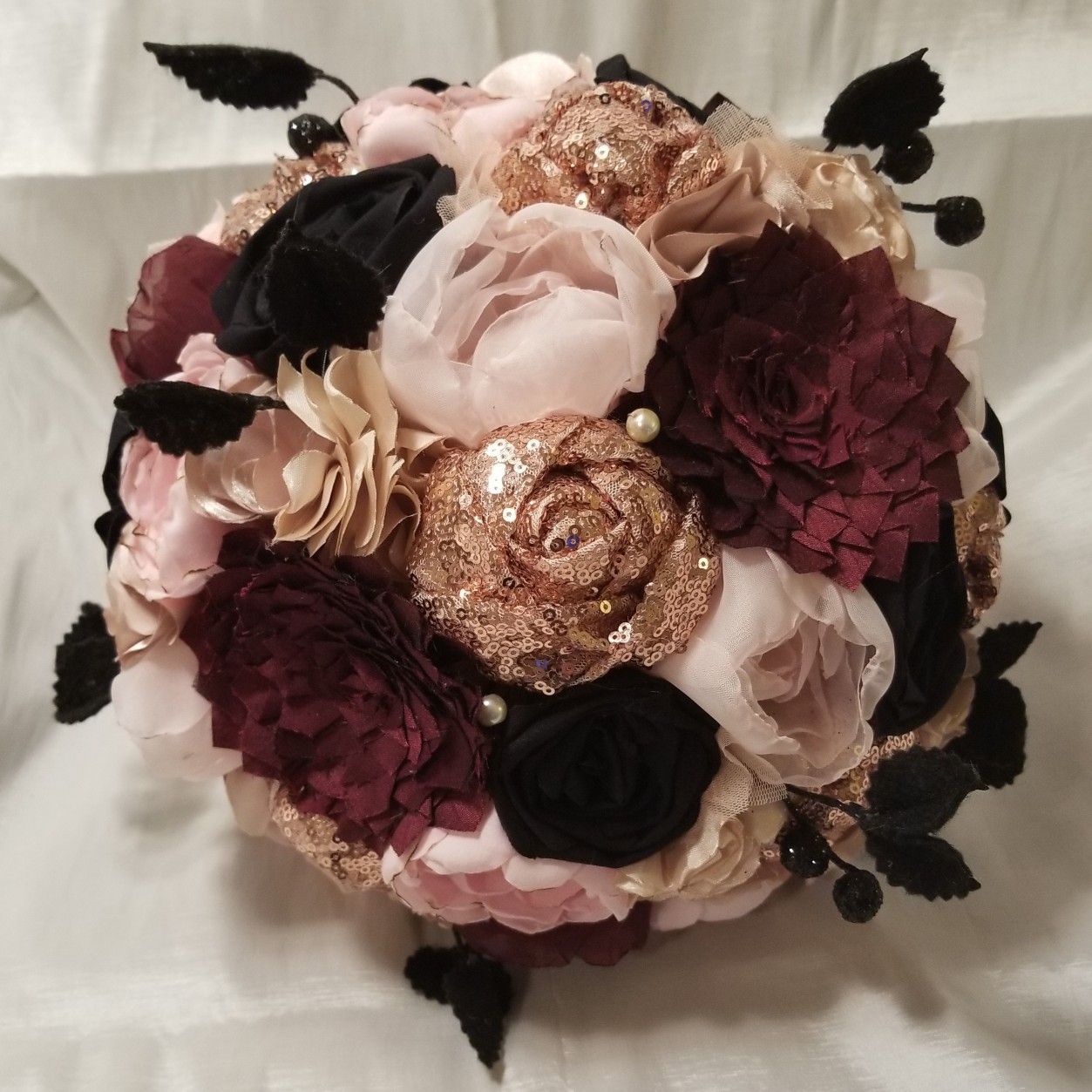 rose gold glitter peach burgundy and black wedding bouquet