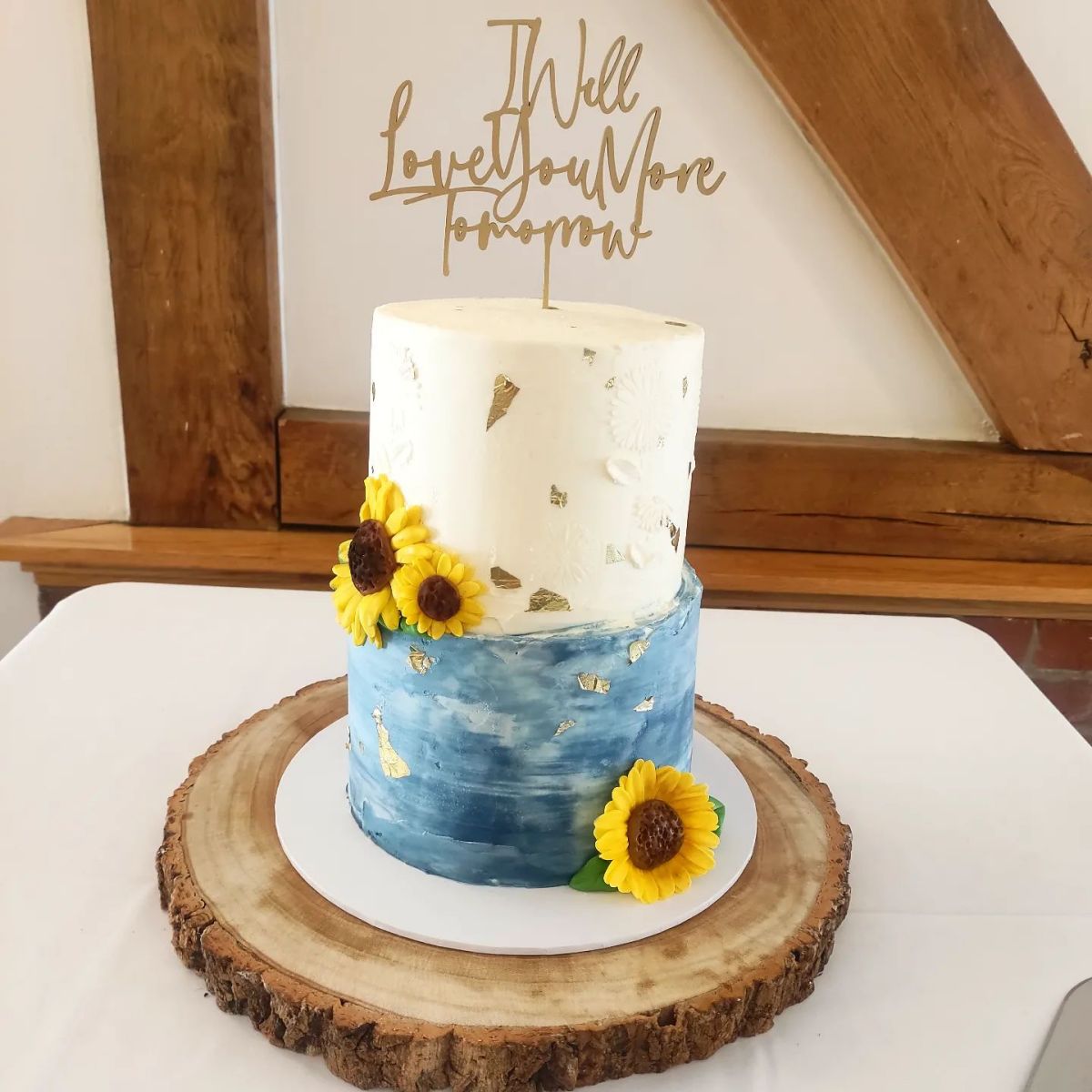 sunflower wedding cake_two tier blue cake with gold laser cut ckae topper kins_cakes185