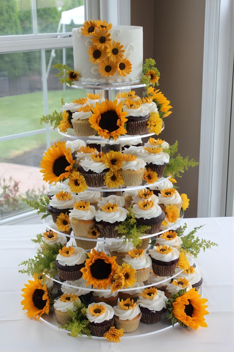 sunflower weding cake with sunflower wedding cupcake tower