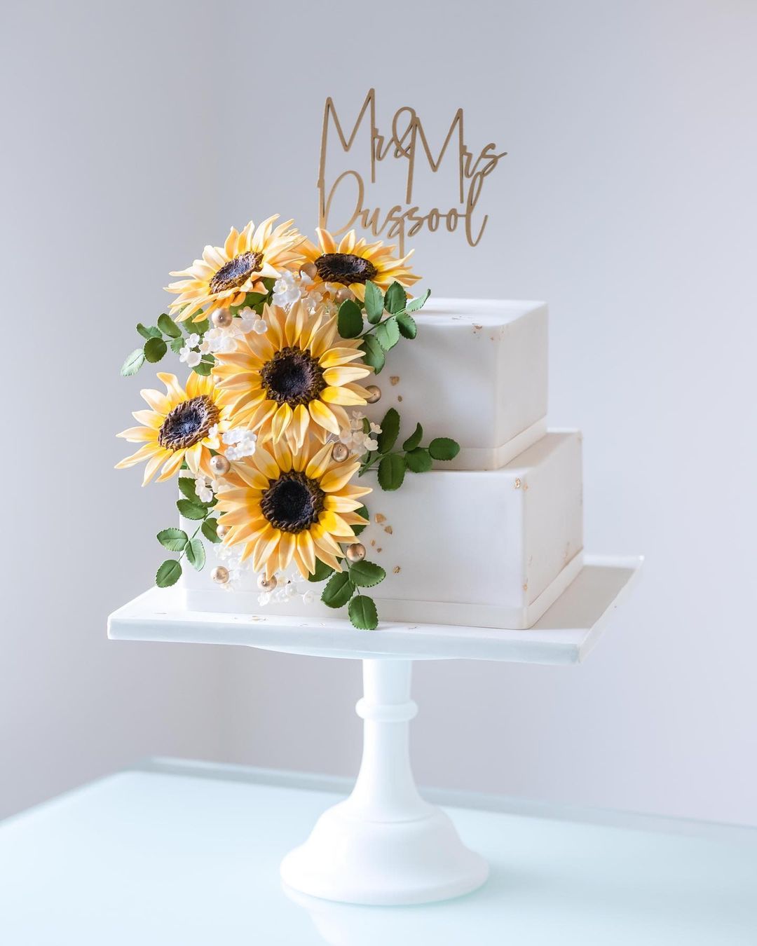 two tier square sunflower wedding cake