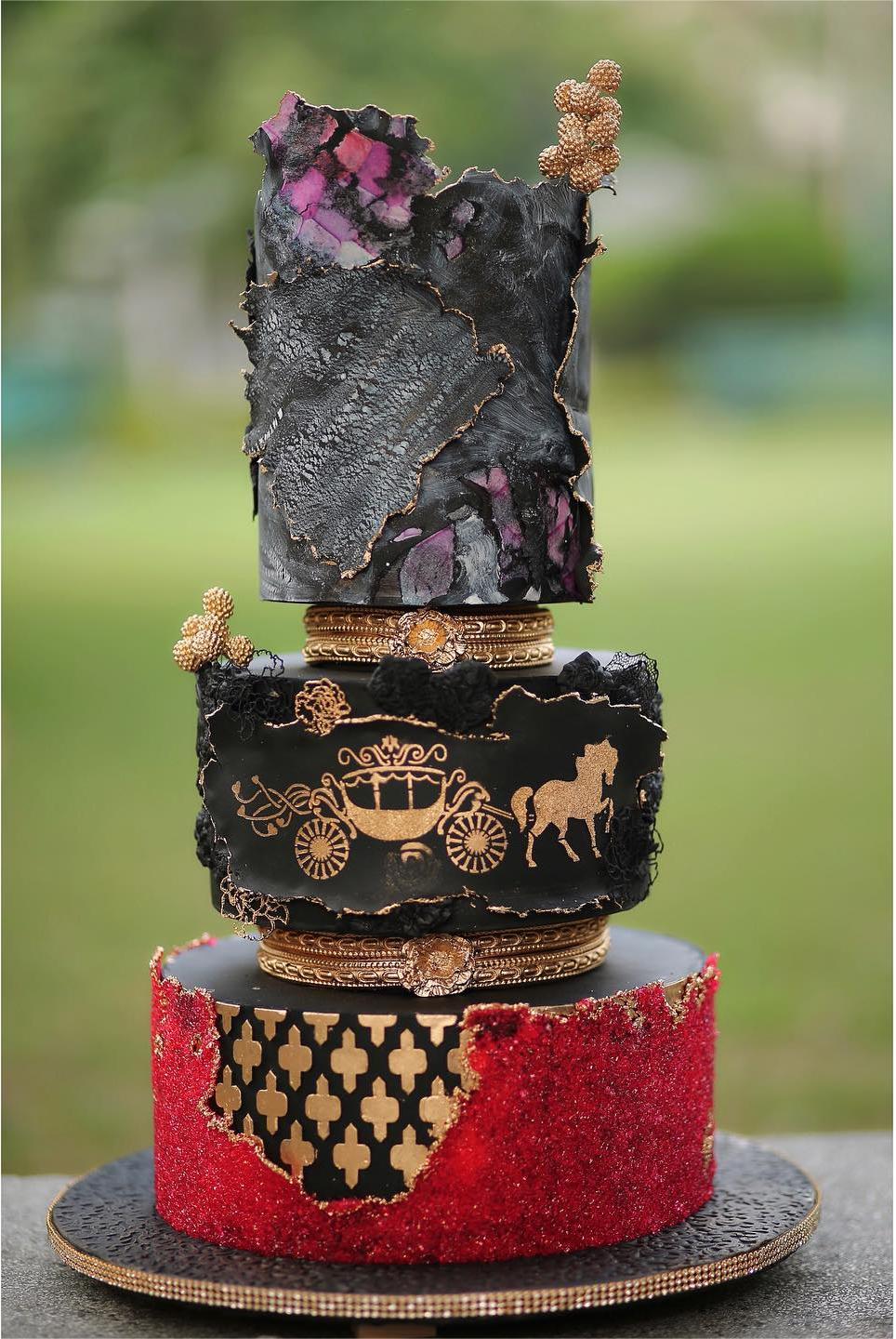 three tier gold black and red wedding cake