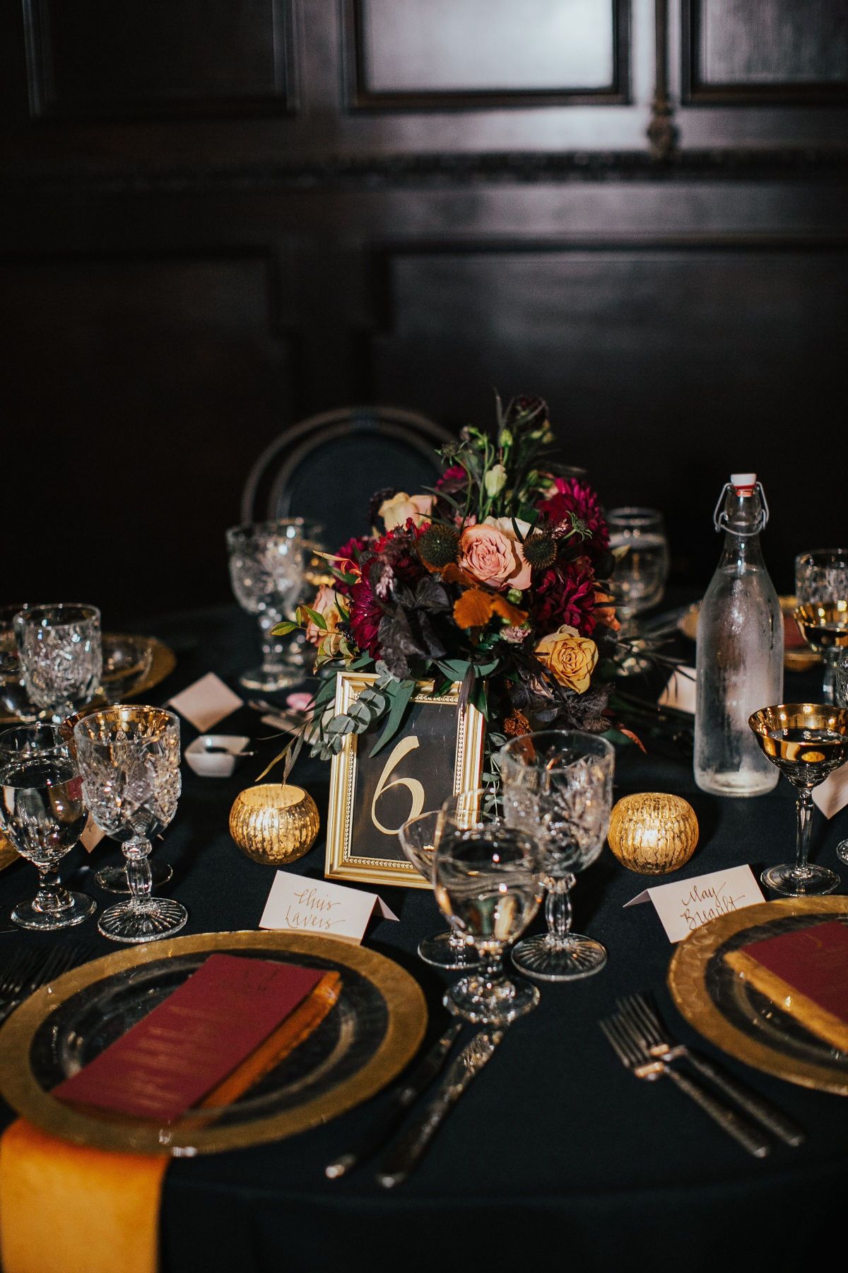 vintage burgundy and black round wedding table decor