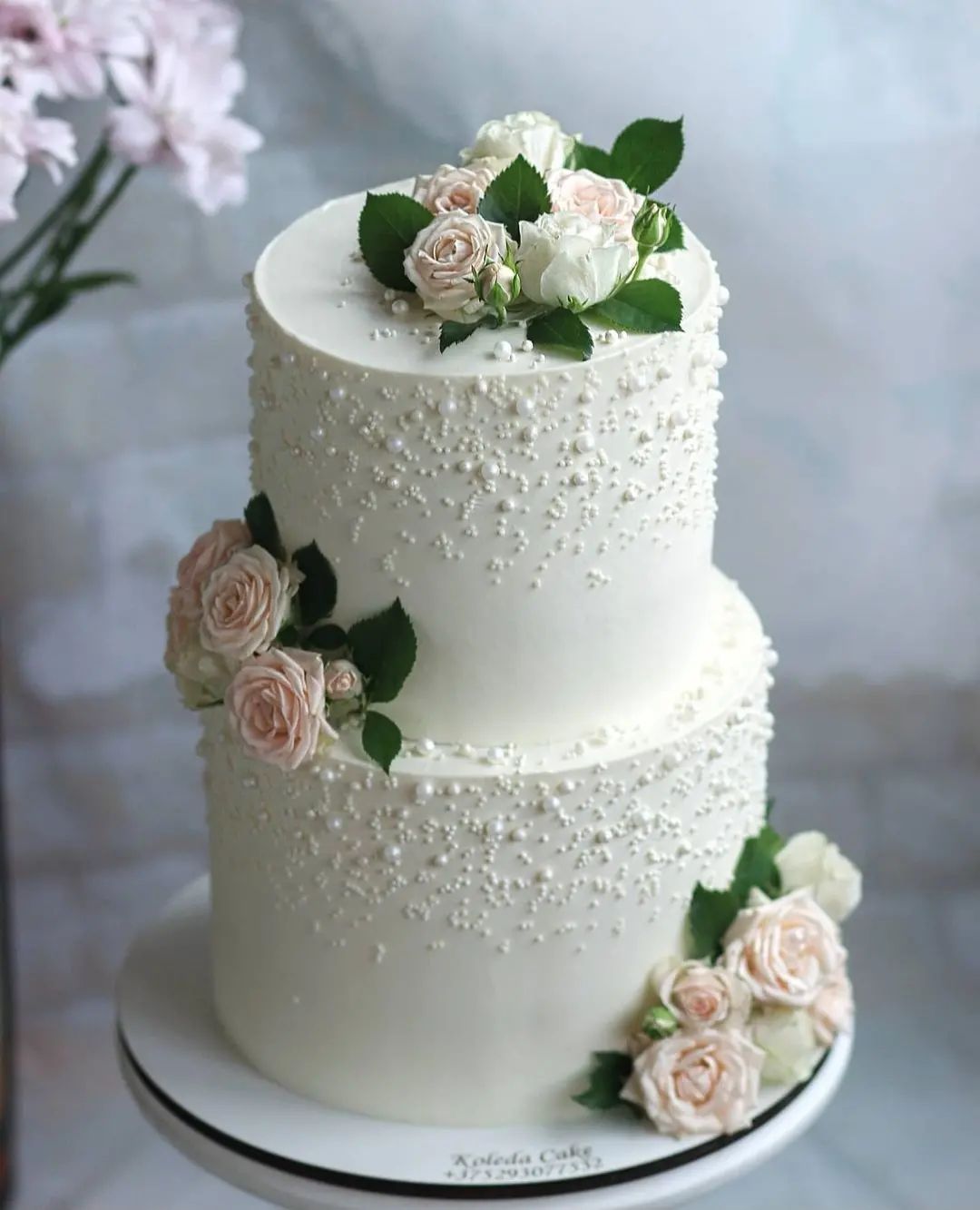 vintage pearl wedding cake with flowers via taraacakes