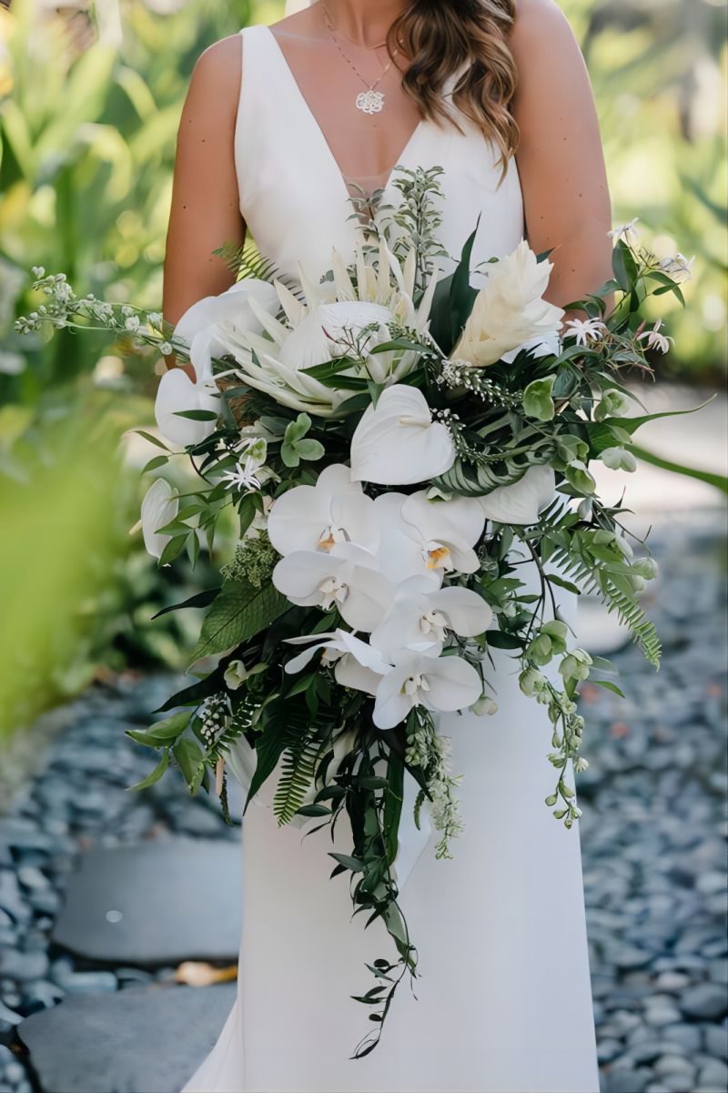 white protea orchids tropical beach wedding bouquet