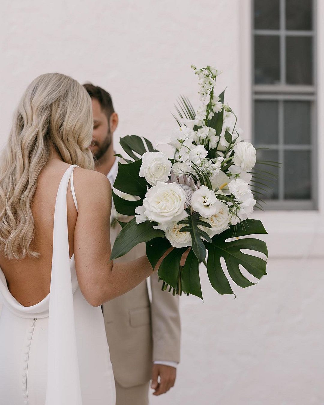 white tropical beach wedding bouquet via whitemagnoliabridal