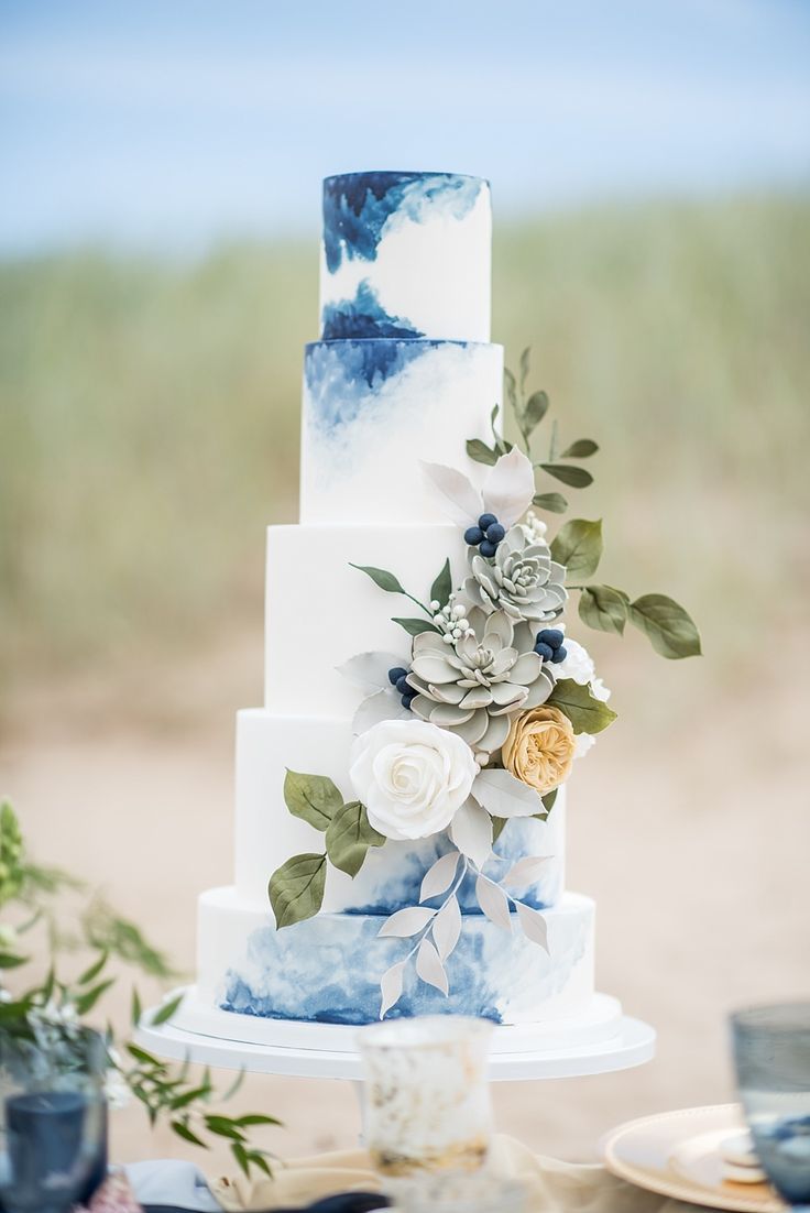 4 tier blue beach wedding cake