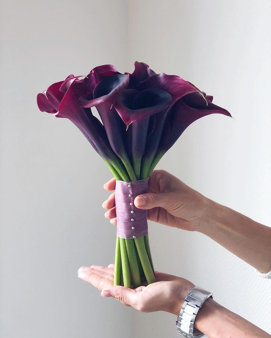 plum purple calla lily wedding bouquet