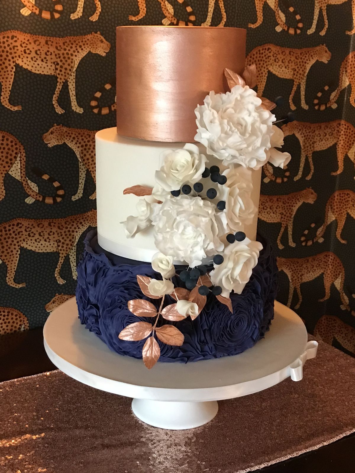 rose gold and navy blue 3 tier wedding cake