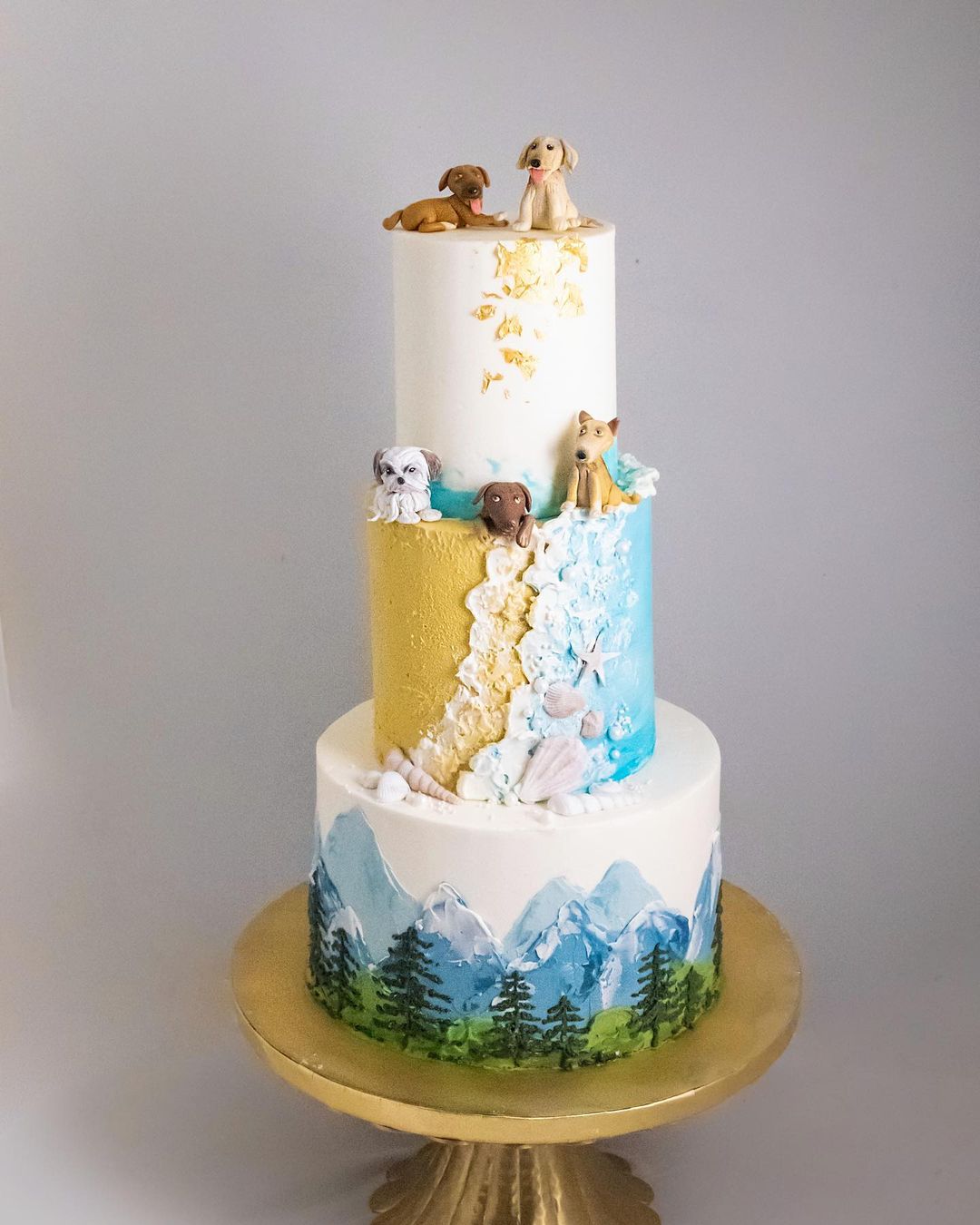 three animal themed forest beach wedding cake flouristabypooja
