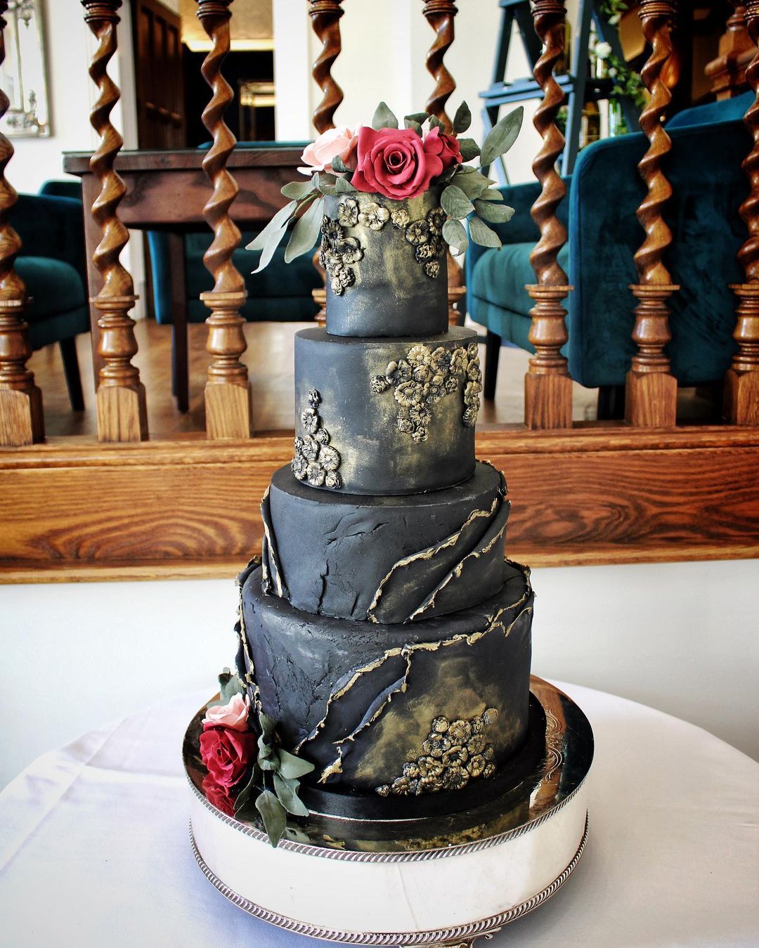 4 tier black red gothic wedding cake with copper tones amybakerscakes