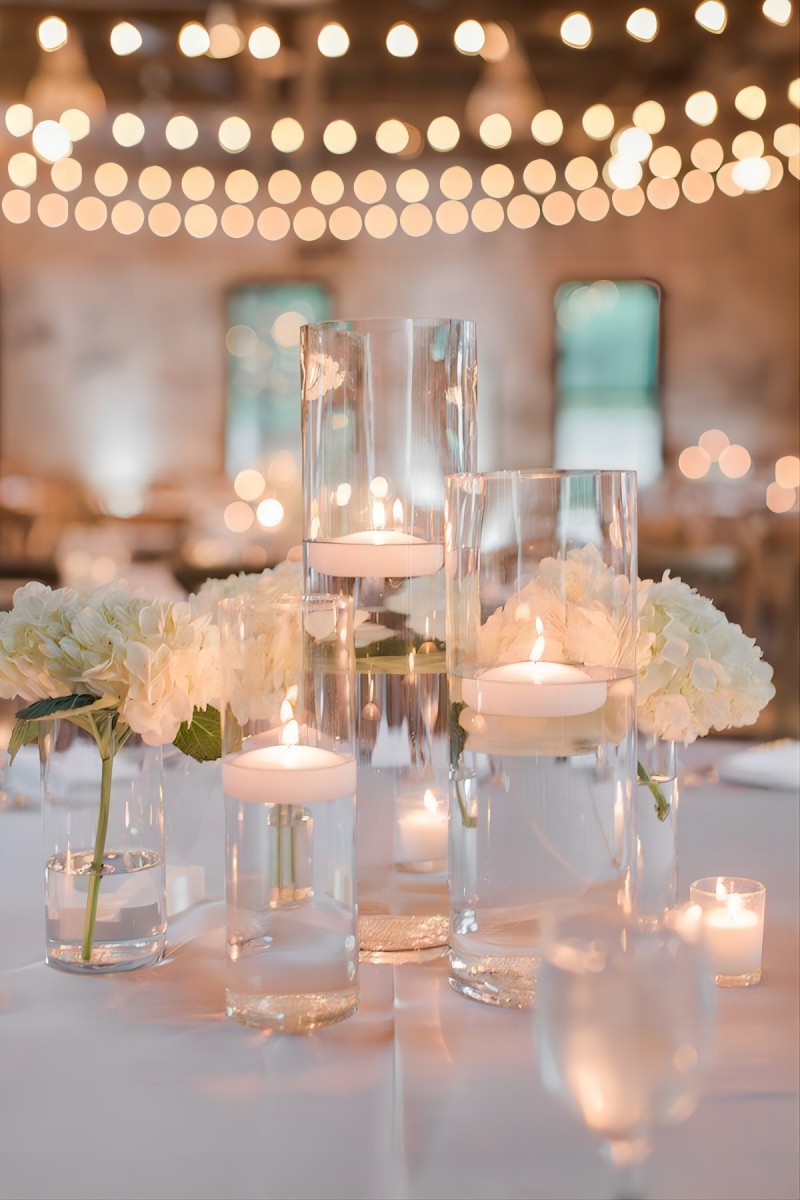 Floating candles and white hydrangea wedding centerpiece