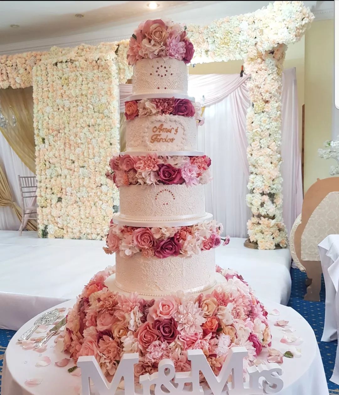 big 4 tier vintage wedding cake with pink flowers via cakesbysaminab