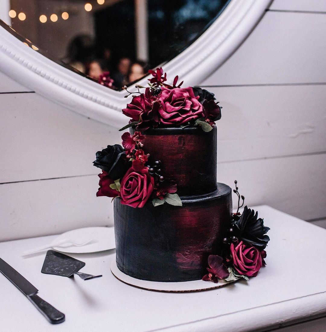 black gothic wedding cake with plum flowers via ashleylynnnxo