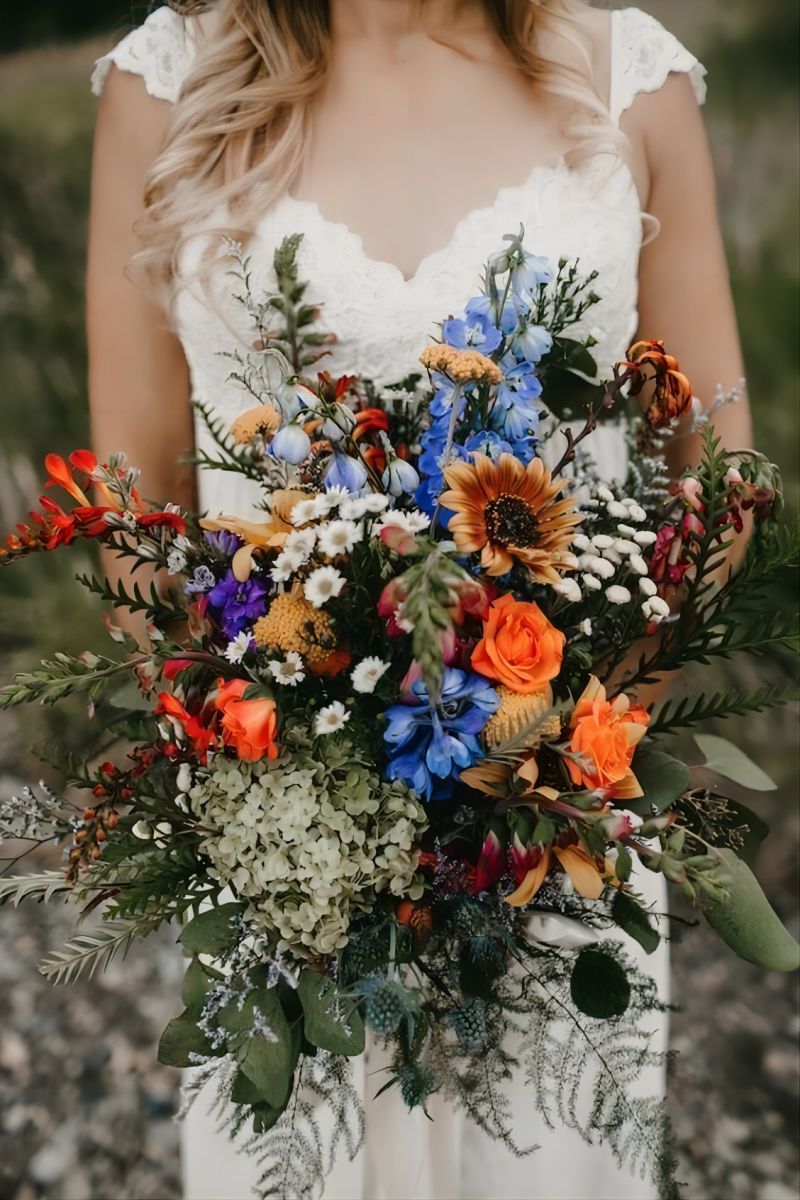 colorful orange blue green wildflower wedding bouquet