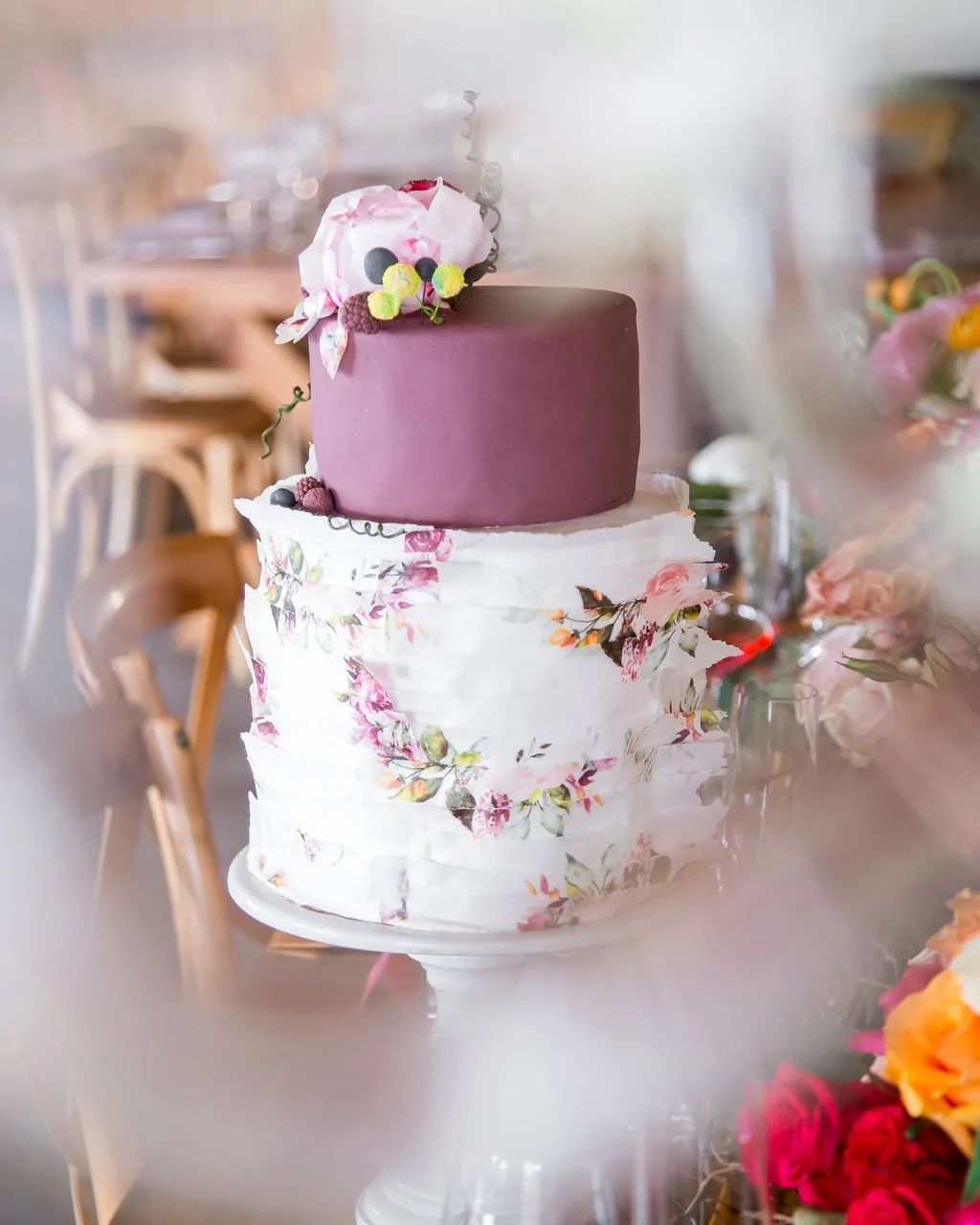 deep mauve 2 tier wedding cake with hand paint flowers via therosycakeco