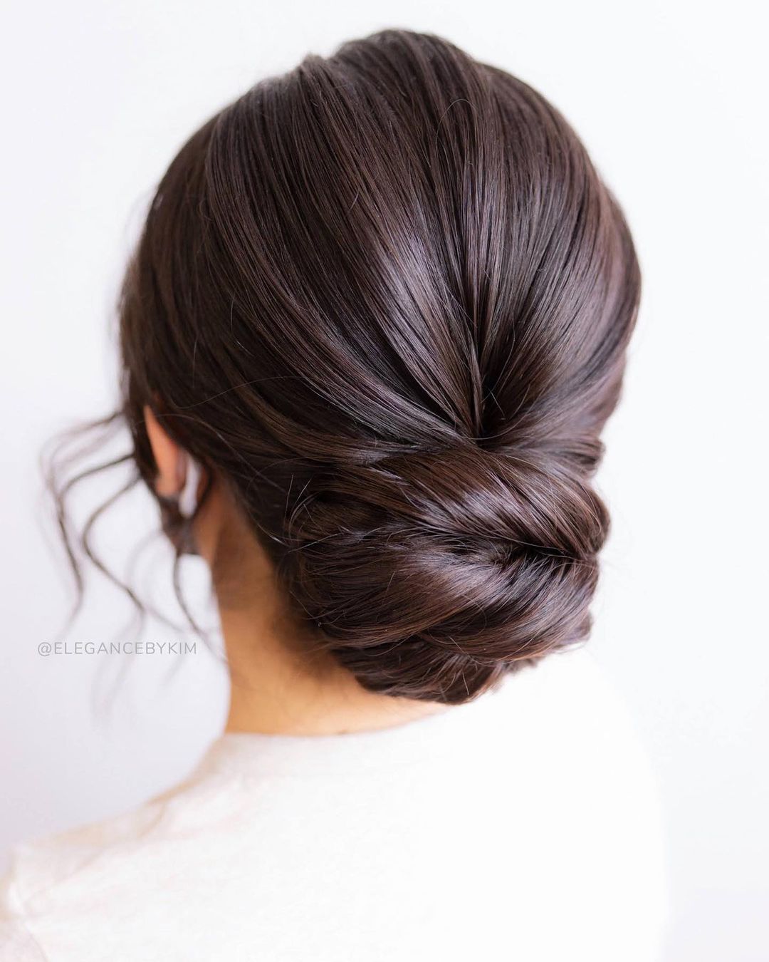 elegant formal low bun bridesmaid updo via elegancebykim