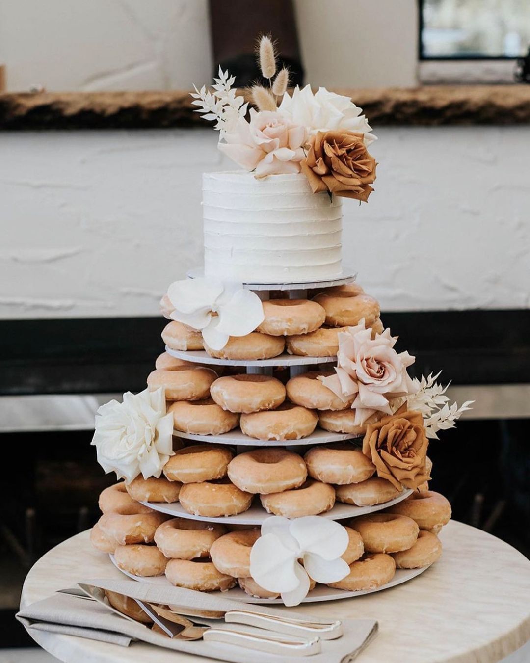 fall donut wedding cake with terracotta roses via sugarprincesscakes